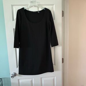 NEVER WORN  super slimming. New  York & Company Black Long Sleeve Dress